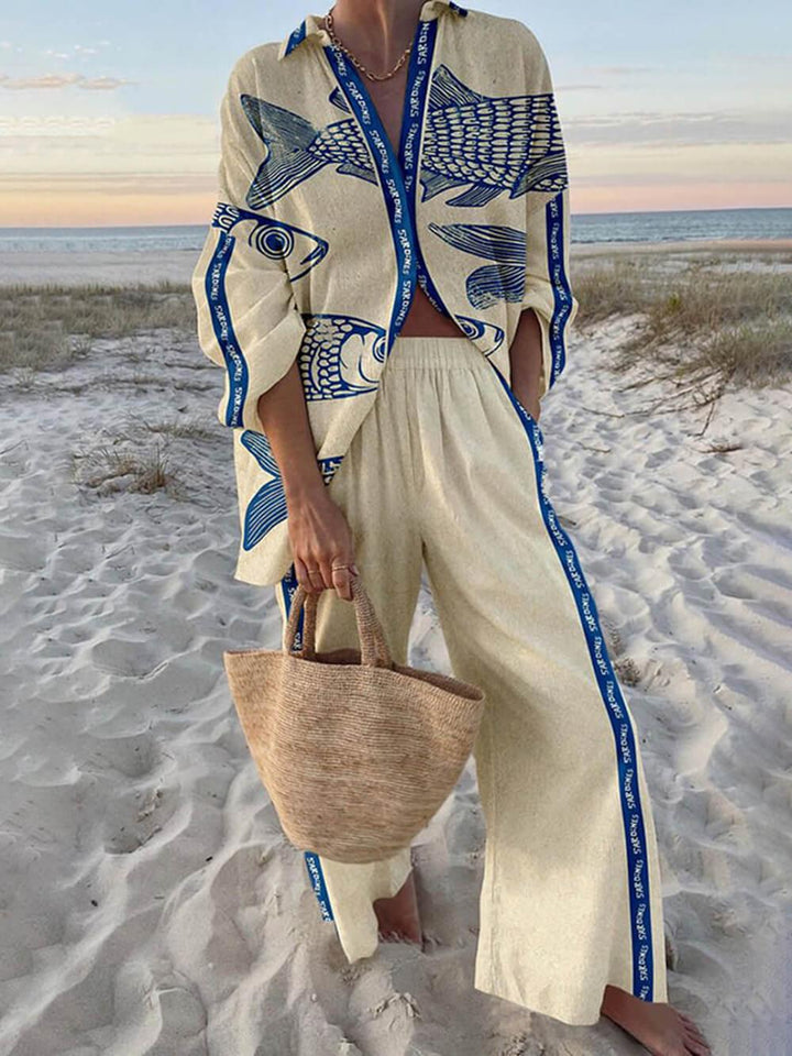 Gisela | Oversized blouse with ocean print from island style and trousers with elastic pockets