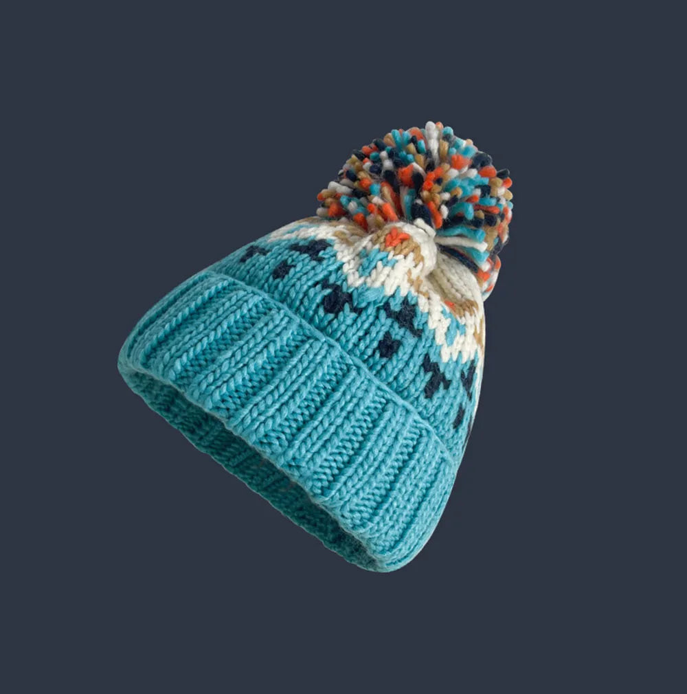 Claire | Cosy Snowflake Pom Beanie